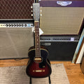 Jim Dandy Parlor, Walnut Fingerboard, Black Pickguard, Deep Cherry Burst
